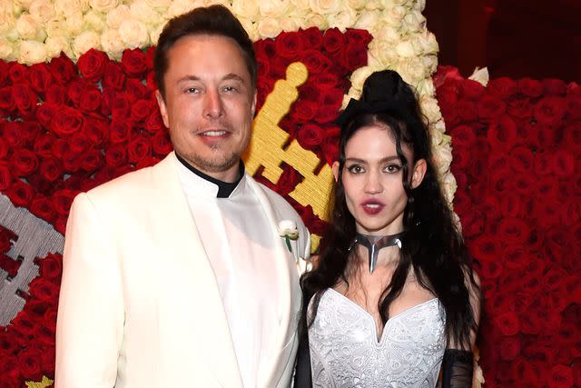 <p>Kevin Mazur/MG18/Getty</p> Elon Musk and Grimes