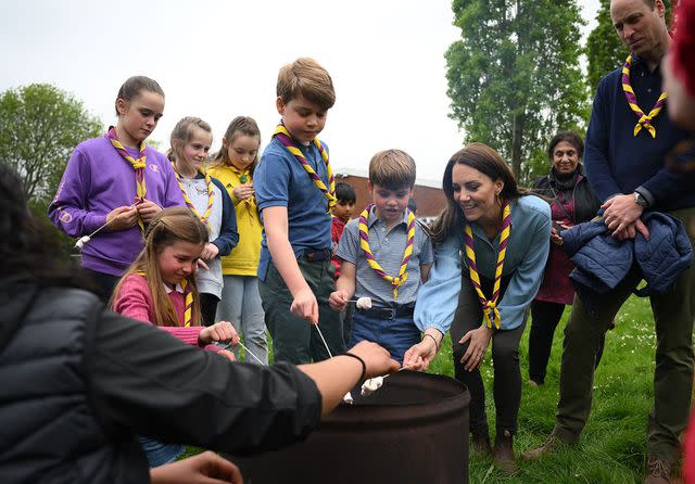 DANIEL LEAL/POOL/AFP via Getty Images From left: Princess Charlotte, Prince George, Prince Louis and Kate Middleton attend the Big Help Out on May 8, 2023