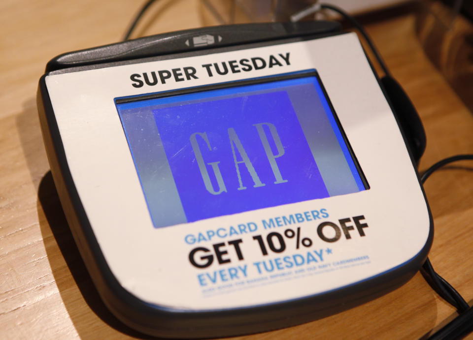 A credit card machine is shown at a Gap store in Palo Alto, Calif., Tuesday, Feb. 23, 2010. (AP Photo/Paul Sakuma)