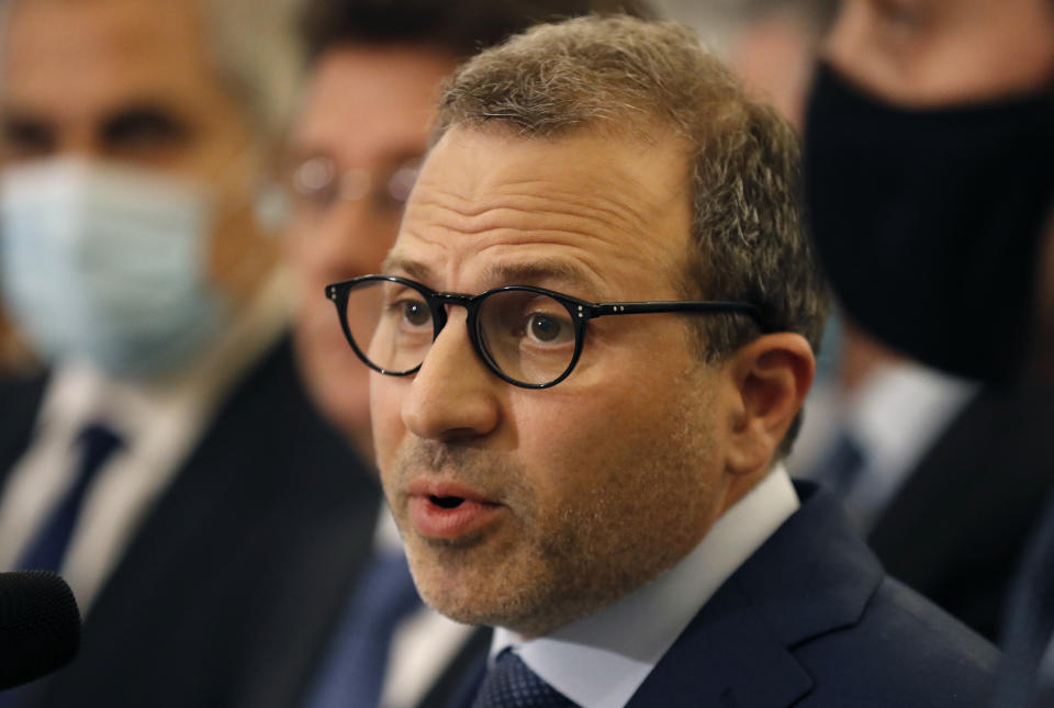 Gebran Bassil who is a current lawmaker who leads the biggest bloc in parliament and is a son-in-law of President Michel Aoun, speaks to journalists at the presidential palace, in Baabda east of Beirut, Lebanon, Thursday, Oct. 22, 2020. The U.S. treasury slapped sanctions Friday, Nov. 6, on Lebanon's ex-foreign minister and a leading Christian political ally of the Hezbollah group, according to the Treasury's website. (AP Photo/Hussein Malla)