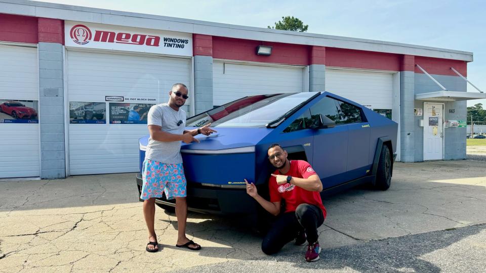 YouTuber Lamar MK with his new Cybertruck, with a blue and yellow wrap.