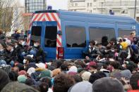 French gendarmes evacuate makeshift migrant camp in the outskirts of Paris