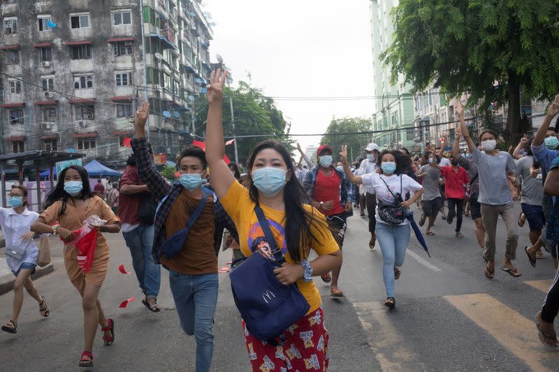 Hundreds of Myanmar activists hold flash mob protest against military rule