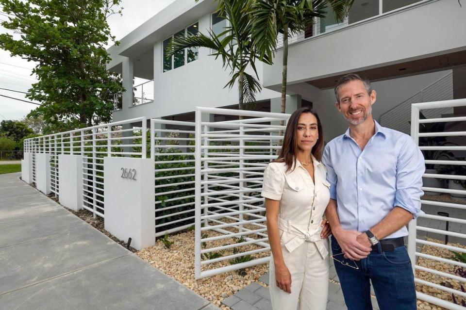“A good house can last 100 years. We are certainly trying to build for 100 years,” said Ted Caplow, co-founder of Caplow Manzano. Caplow stands beside the firm’s other co-founder and his wife, Nathalie Manzano, in front of their newly constructed house in the Miami neighborhood of Silver Bluff on Thursday, April 4, 2024.