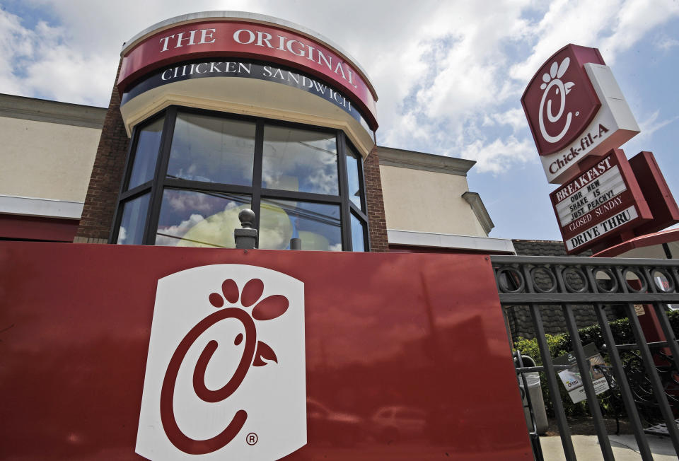 FILE - This Thursday, July 19, 2012 photo shows a Chick-fil-A fast food restaurant in Atlanta. Chick-fil-A, whose founder distinguished the fast-food chain by closing on Sunday out of religious piety, continues to mix theology with business and finds itself on the front lines of the nation’s culture wars after its president, Dan Cathy, confirmed his opposition to gay marriage in June 2012. (AP Photo/Mike Stewart)