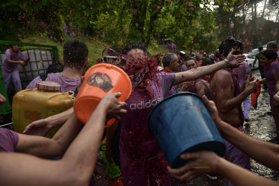 <p>People take part in a wine battle, in the small village of Haro, northern Spain, Friday, June 29, 2018. (Photo: Alvaro Barrientos/AP) </p>