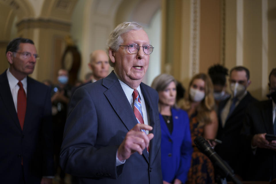 Senate Minority Leader Mitch McConnell, R-Ky., speaks to reporters as work continues on the Democrats' Build Back Better Act, massive legislation that is a cornerstone of President Joe Biden's domestic agenda, at the Capitol in Washington, Tuesday, Sept. 14, 2021. (AP Photo/J. Scott Applewhite)