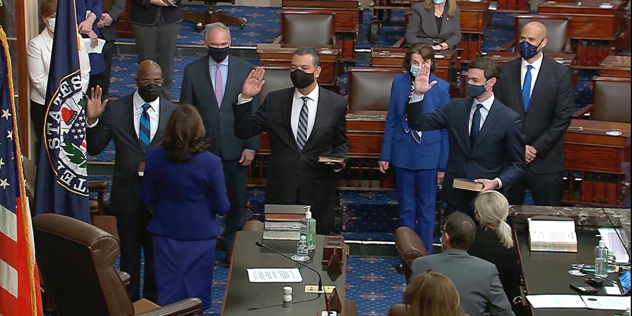 In this image from video, Vice President Kamala Harris swears in Sen. Raphael Warnock, D-Ga., Sen. Alex Padilla, D-Calif., and Sen. Jon Ossoff, D-Ga., on the floor of the Senate Wednesday, Jan. 6, 2021, on Capitol Hill in Washington.