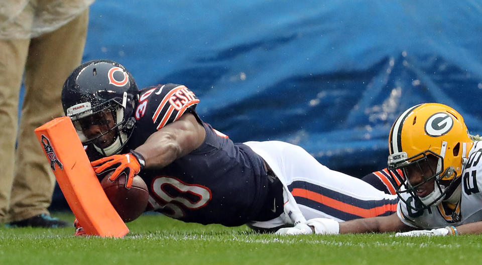 <p>Chicago Bears running back Benny Cunningham (30) runs ahead of the Green Bay Packers defense but his dive for the end zone was ruled a fumble and turnover after review in the second quarter Sunday, Nov. 12, 2017 at Soldier Field in Chicago. The Packers won, 23-16. (Brian Cassella/Chicago Tribune/TNS) </p>