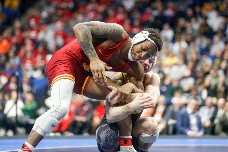 Five-time state champion David Carr of Perry, top, is one of 13 national champions to have won titles at Fargo from the Greater Akron/Canton area in the last 11 years.