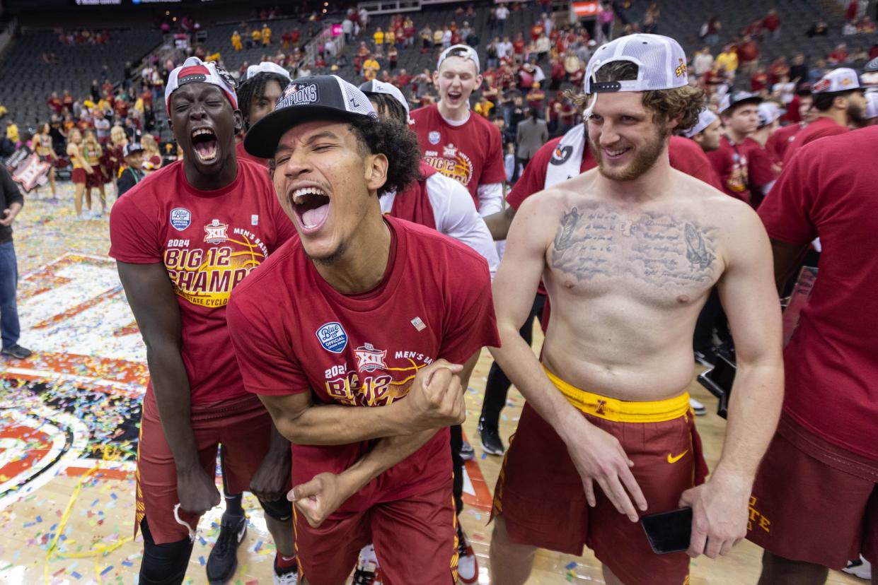 Iowa State Cyclones guard Curtis Jones (5) and Iowa State Cyclones forward Conrad Hawley (23) celebrate after the game against the Houston Cougars at T-Mobile Center.