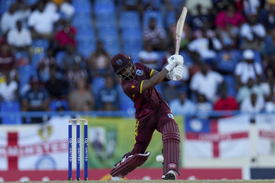 West Indies' captain Shai Hope plash a shot against England during the first ODI cricket match at Sir Vivian Richards Stadium in North Sound, Antigua and Barbuda, Sunday, Dec. 3, 2023. (AP Photo/Ricardo Mazalan)