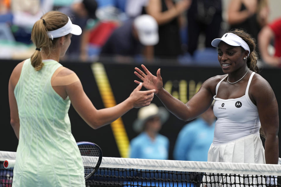 Sloane Stephens, right, of the U.S. congratulates Anna Kalinskaya of Russia following their third round match at the Australian Open tennis championships at Melbourne Park, Melbourne, Australia, Saturday, Jan. 20, 2024. (AP Photo/Alessandra Tarantino)