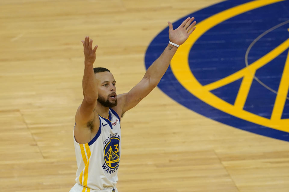 Golden State Warriors guard Stephen Curry (30) gestures after shooting a 3-point basket against the Memphis Grizzlies during the second half of an NBA basketball game in San Francisco, Sunday, May 16, 2021. (AP Photo/Jeff Chiu)