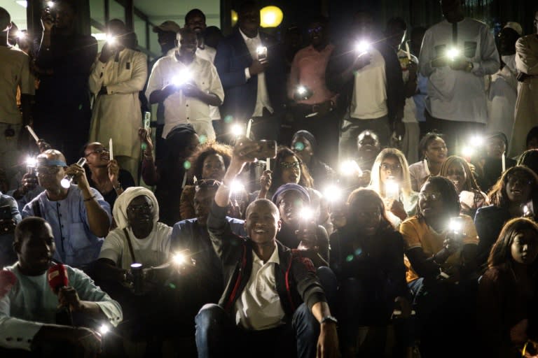 Members of the Senegalese media at a vigil to protest against police violence (JOHN WESSELS)