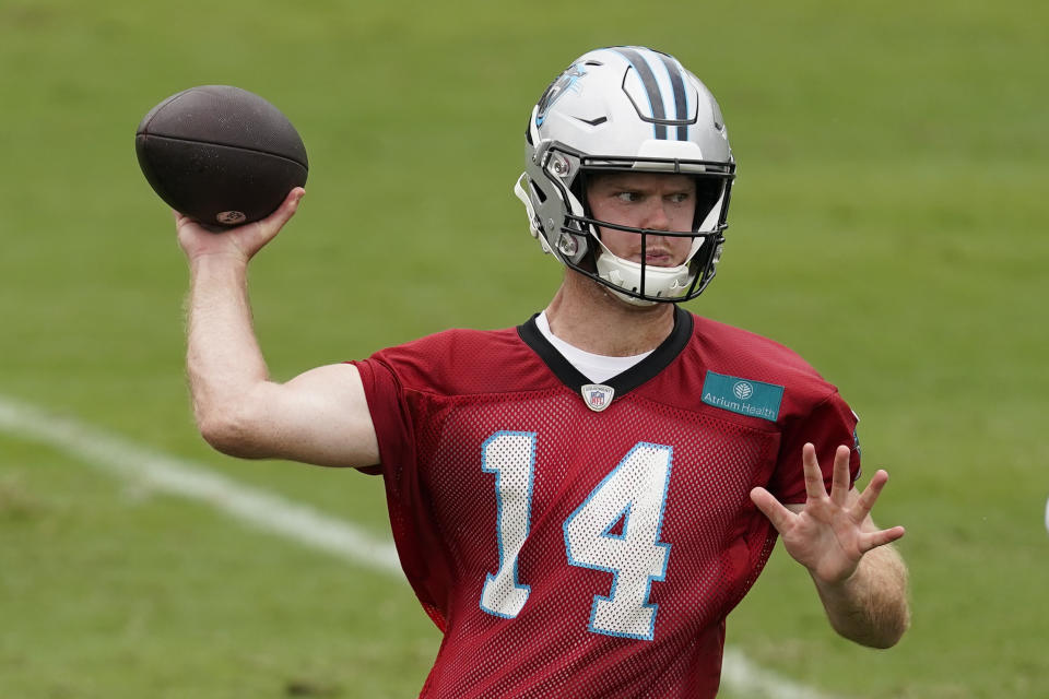 FILE - Carolina Panthers' Sam Darnold practices during the NFL football team's training camp at Wofford College in Spartanburg, S.C., Saturday, July 30, 2022. Two weeks into training camp and the battle for the Panthers starting quarterback remains undecided with Baker Mayfield and Sam Darnold competing for the job.(AP Photo/Chris Carlson, File)