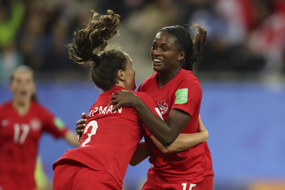 Canada's Nichelle Prince, right, celebrates with Canada's Allysha Chapman after scoring her side's second goal during the Women's World Cup Group E soccer match between Canada and New Zealand in Grenoble, France, Saturday, June 15, 2019. (AP Photo/Francisco Seco)