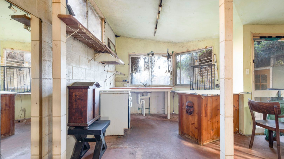 The kitchen of the dilapidated home in Redfern.