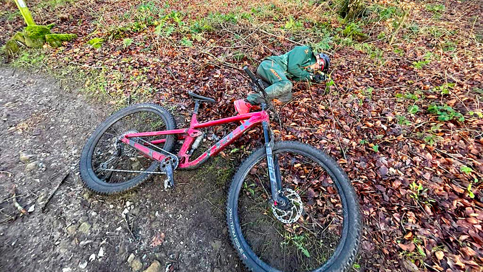 Post crash bike and rider in foetal position