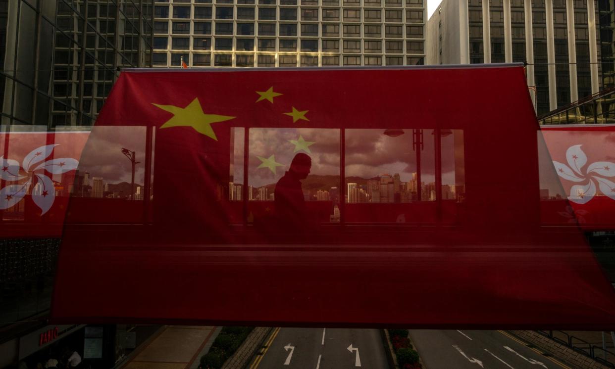 <span>Hong Kong’s Article 23 law proposes sentences of up to life in prison for some crimes including insurrection and treason.</span><span>Photograph: Louise Delmotte/AP</span>