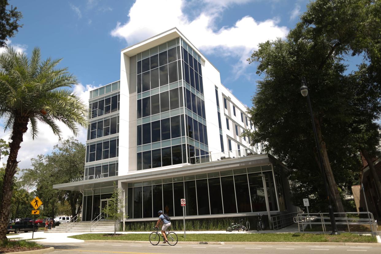 The Infinity Hall building along Southwest Second Ave in Gainesville. City commissioners approved land-use and zoning changes that allow a 12-story apartment building to be constructed on a parking lot across the street.