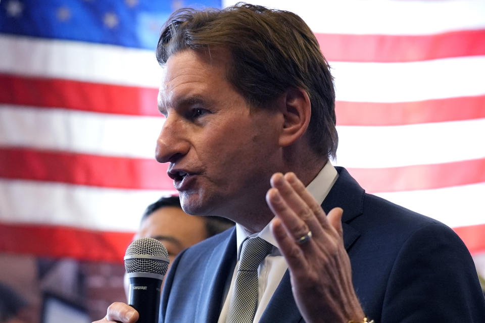 FILE - Democratic presidential candidate Rep. Dean Phillips, D-Minn., gestures while addressing a gathering during a campaign stop, Jan. 18, 2024, in Manchester, N.H. Phillips ended his long-shot 2024 Democratic presidential bid on Wednesday after failing to win a primary contest against President Joe Biden.(AP Photo/Charles Krupa, File)