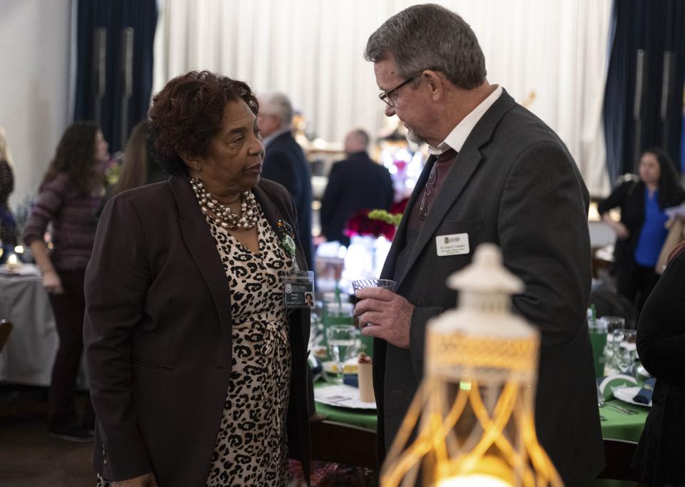 Former Columbia Vice Mayor Dr. Christa Martin talks with Dr. Dearl Lampley vice president of Columbia State Community College at the annual dinner hosted by Maury County Chamber & Economic Alliance at the Memorial Building on Jan. 30 in Columbia, Tenn.