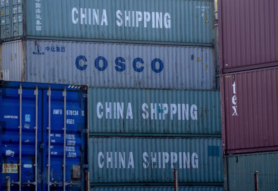 FILE - Containers coming from China are piled in the harbor in Hamburg, Germany, on Oct. 26, 2022. Over the past two decades, the Chinese government has often used its growing economic heft to peel France, Germany and other allies away from the United States on issues ranging from military security and trade to human rights and Taiwan. (AP Photo/Michael Probst, File)