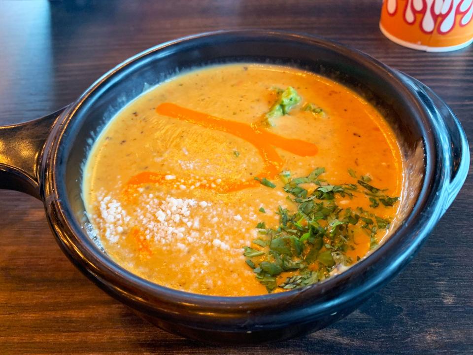 The queso is a signature item at Torchy's Tacos, but the guacamole was barely present.