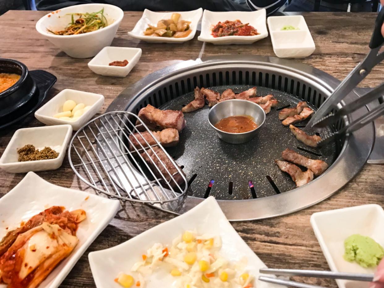 korean BBQ at table in local restaurant in Seoul city (snapshot by mobile smartphone)