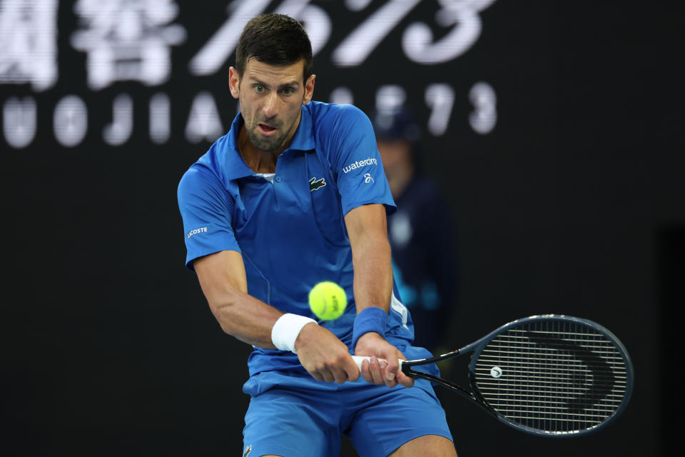 Novak Djokovic of Serbia is in action during his round one singles match against Dino Primiz of Croatia on day one of the 2024 Australian Open at Melbourne Park in Melbourne, Australia, on January 14, 2024. (Photo by Ciro De Luca/NurPhoto via Getty Images)