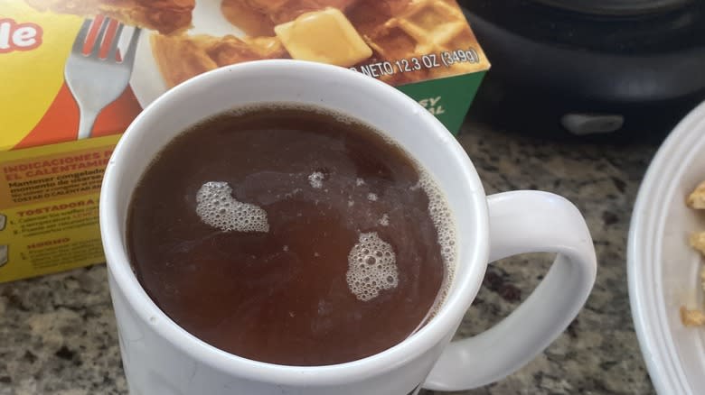 Eggo creamer mixing in coffee