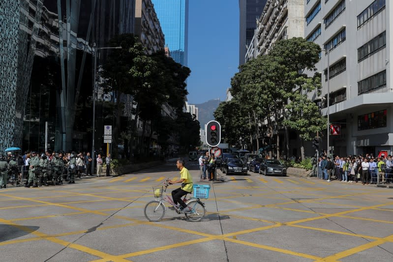 Hong Kong holds its breath ahead of polls amid a lull in violence