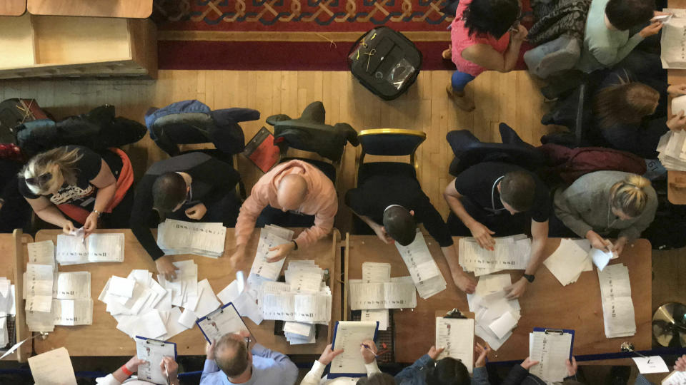 Counting in the local government elections begins at Belfast City Hall, Northern Ireland, Friday May 3, 2019. Elections were held Thursday for more than 8,000 seats on 259 local authorities across England — although not in London — and Northern Ireland. (Rebecca Black/PA via AP)