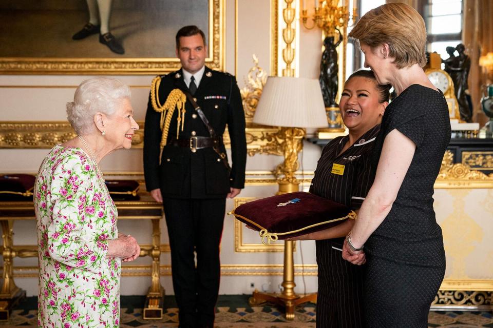 Queen Elizabeth II presents the George Cross to NHS England CEO Amanda Pritchard (R), and May Parsons, Modern Matron at University Hospital Coventry and Warkwickshire, representatives of Britain's National Health Service (NHS), during an Audience at Windsor Castle