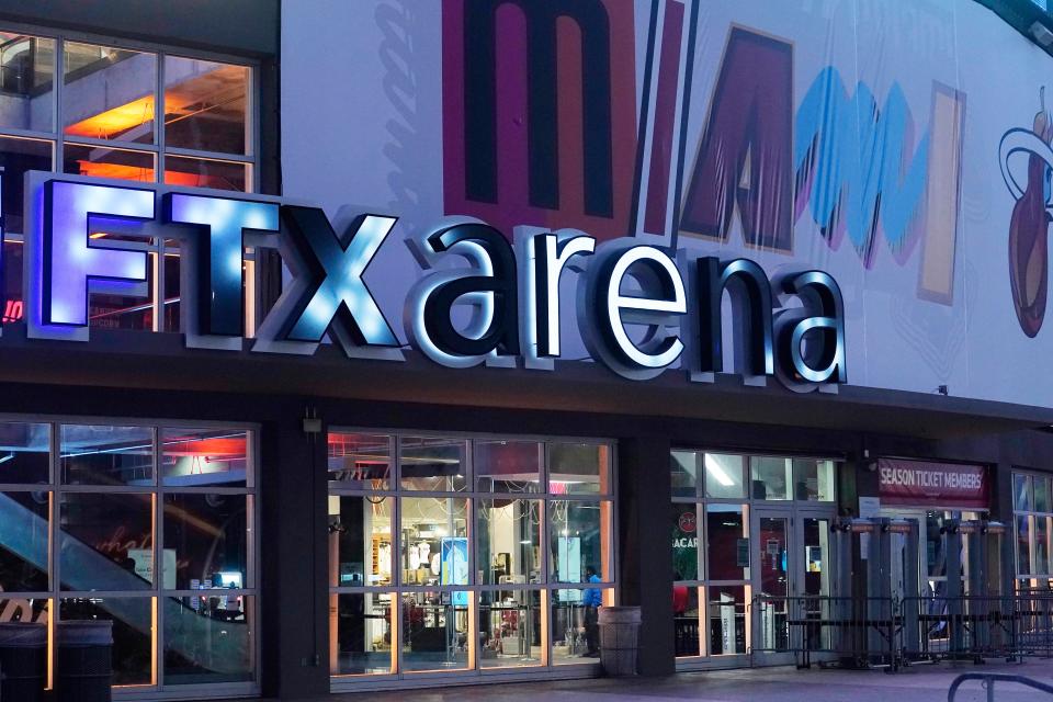 A sign for the FTX Arena, where the Miami Heat basketball team plays, is illuminated on Nov. 12, 2022, in Miami. FTX filed for bankruptcy protection Friday, Nov. 11.