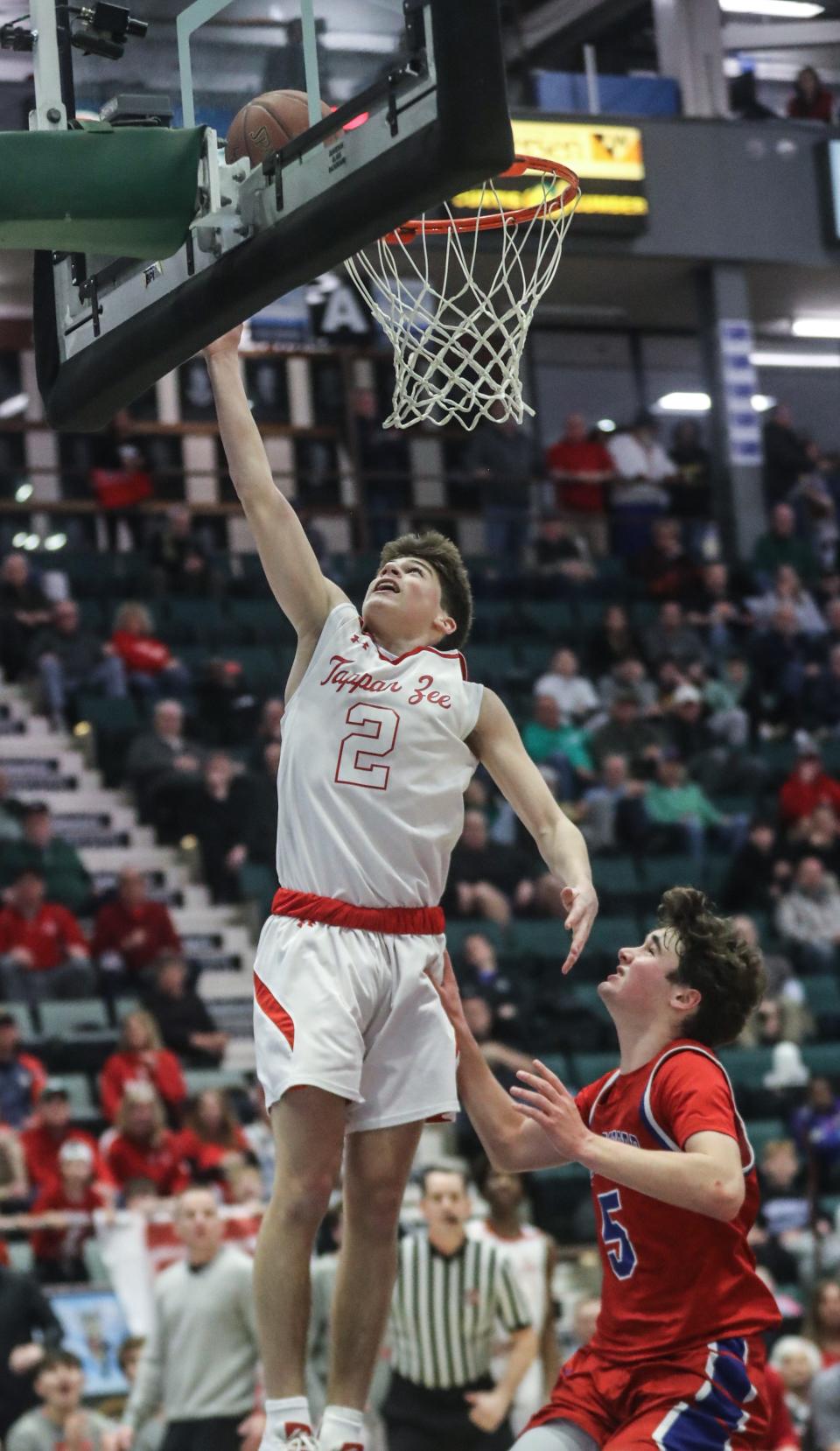 Tommy Lineman of Tappan Zee scores two of his game high 20 points against New Hartford during a Class A NYSPHSAA semifinal basketball game at the Cool Insuring Arena in Glens Falls March 17, 2023. Tappan Zee defeated New Hartford 58-48.