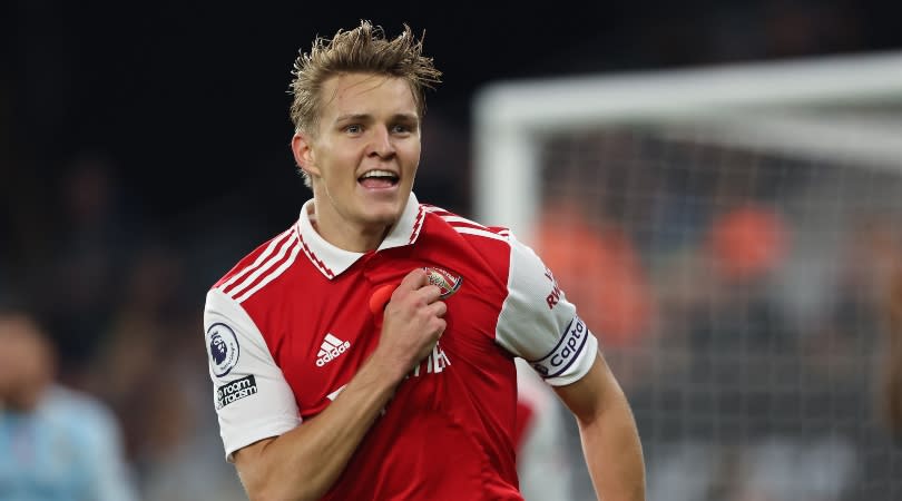 Martin Odegaard celebrates after scoring for Arsenal against Wolves.