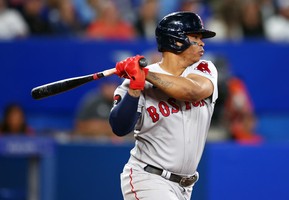 TORONTO, ON - SEPTEMBER 30:  Rafael Devers #11 of the Boston Red Sox bats against the Toronto Blue Jays at Rogers Centre on September 30, 2022 in Toronto, Ontario, Canada.  (Photo by Vaughn Ridley/Getty Images)