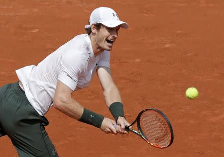 Tennis - French Open - Roland Garros - Ivo Karlovic of Croatia v Andy Murray of Britain - Paris, France - 27/05/16. Murray returns a shot. REUTERS/Jacky Naegelen