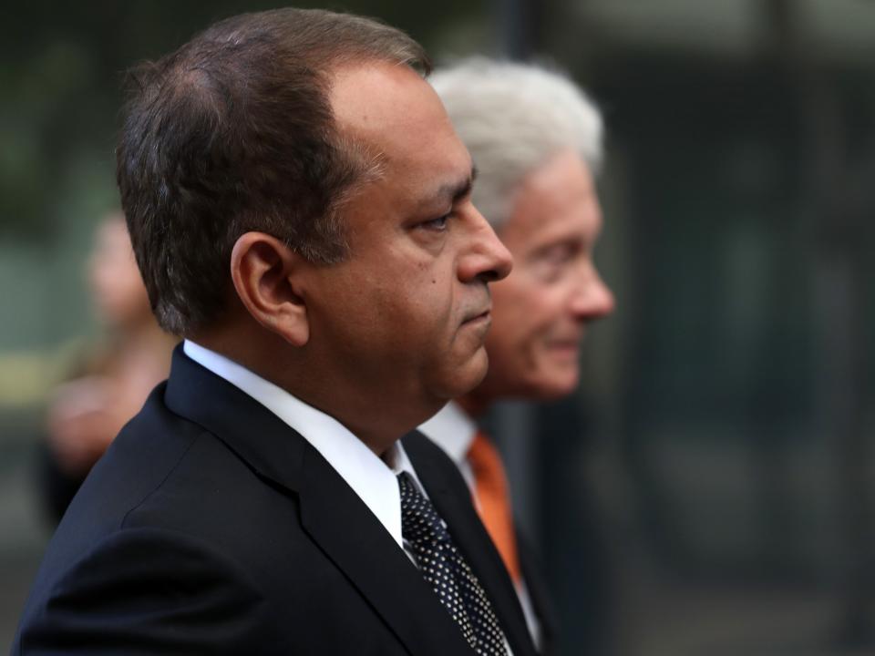 Former Theranos COO Ramesh Balwani (L) arrives at the Robert F. Peckham U.S. Federal Court on April 22, 2019 in San Jose, California. Former Theranos CEO Elizabeth Holmes and former COO Ramesh Balwani appeared in federal court for a status hearing. Both are facing charges of conspiracy and wire fraud for allegedly engaging in a multimillion-dollar scheme to defraud investors with the Theranos blood testing lab services.