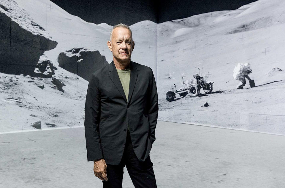 Tom Hanks stands inside Lightroom, the venue for the new visual experience, 