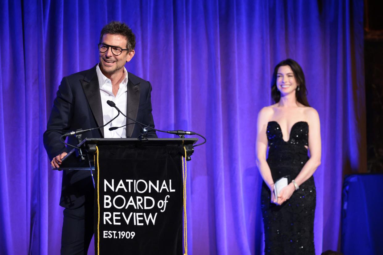 Bradley Cooper, left, is an expert filmmaker and pizza-maker, according to pal Anne Hathaway.