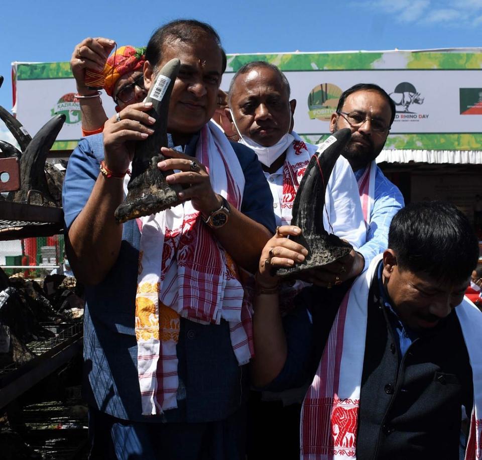 <div class="paragraphs"><p>Chief Minister of Assam Himanta Biswa Sarma poses with a rhino horn</p></div>