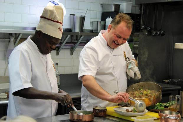 The Northern Echo: FLASHBACK - Former Archbishop of York Dr John Sentamu and Andrew Pern cooking at the Star Inn at Harome