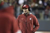 Washington State head coach Jake Dickert walks on the field during a break in play in the first half of an NCAA college football game against Washington, Saturday, Nov. 26, 2022, in Pullman, Wash. (AP Photo/Young Kwak)