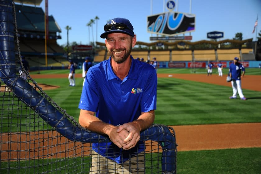 Dodgers groundskeeper Jordan Lorenz. Los Angeles Dodgers vs Colorado Rockies Wednesday, April 19, 2017 at Dodger Stadium in Los Angeles,California. Photo by Jon SooHoo/©Los Angeles Dodgers,LLC 2017