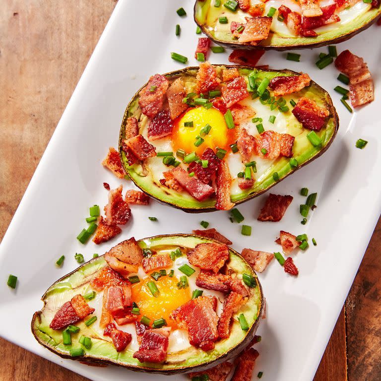 <p><a href="https://www.delish.com/cooking/recipe-ideas/recipes/a57655/stuffed-avocados-3-ways-recipe/" rel="nofollow noopener" target="_blank" data-ylk="slk:Stuffed avocados;elm:context_link;itc:0;sec:content-canvas" class="link ">Stuffed avocados</a> are our favorite way to eat the power fruit. It's creamy texture pairs perfectly with a just-set egg and crispy bacon.<br><br>Get the <strong><a href="https://www.delish.com/cooking/recipe-ideas/recipes/a45382/avocado-egg-boats-recipe/" rel="nofollow noopener" target="_blank" data-ylk="slk:Avocado Egg Boats recipe;elm:context_link;itc:0;sec:content-canvas" class="link ">Avocado Egg Boats recipe</a></strong>. </p>