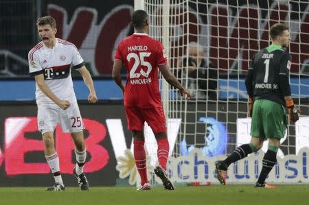 Football Soccer - Hanover 96 v Bayern Munich - German Bundesliga - HDI Arena, Hanover, Germany- 05/12/15 Bayern Munich's Thomas Mueller celebrates after scoring the first goal against Hanover 96. REUTERS/Fabian Bimmer