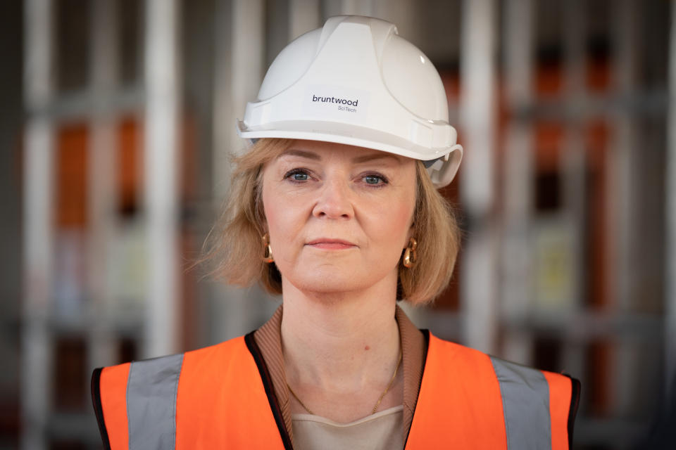 BIRMINGHAM, ENGLAND - OCTOBER 04: Prime Minister Liz Truss during a visit to a construction site for a medical innovation campus in Birmingham, on day three of the Conservative Party annual conference at the International Convention Centre in Birmingham on October 04, 2022 in Birmingham, England. This year the Conservative Party Conference will be looking at 